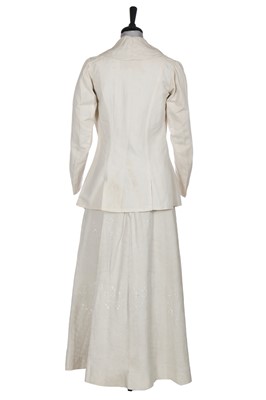 Lot 503 - A rare Redfern ivory linen summer sporting suit, circa 1905
