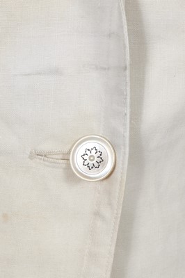 Lot 503 - A rare Redfern ivory linen summer sporting suit, circa 1905