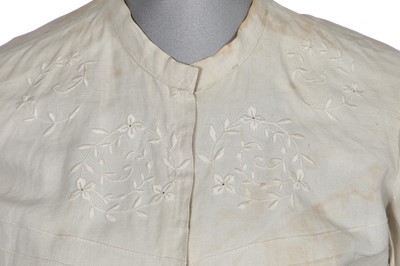 Lot 503 - A rare Redfern ivory linen summer sporting suit, circa 1905