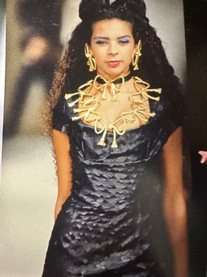 Lot 172 - A rare Vivienne Westwood slashed leather mini dress, 'Dressing Up' collection, Autumn-Winter 1991-92