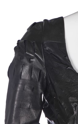 Lot 172 - A rare Vivienne Westwood slashed leather mini dress, 'Dressing Up' collection, Autumn-Winter 1991-92