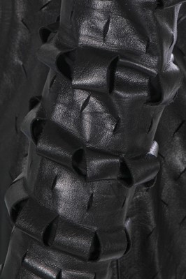 Lot 172 - A rare Vivienne Westwood slashed leather mini dress, 'Dressing Up' collection, Autumn-Winter 1991-92