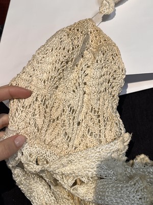 Lot 177 - A Vivienne Westwood tasselled ivory knitted ensemble, 'Cafe Society' collection, Spring-Summer 1994