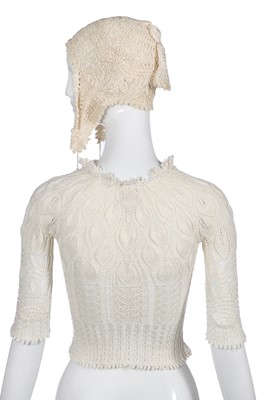 Lot 177 - A Vivienne Westwood tasselled ivory knitted ensemble, 'Cafe Society' collection, Spring-Summer 1994