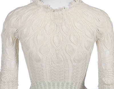 Lot 177 - A Vivienne Westwood tasselled ivory knitted ensemble, 'Cafe Society' collection, Spring-Summer 1994