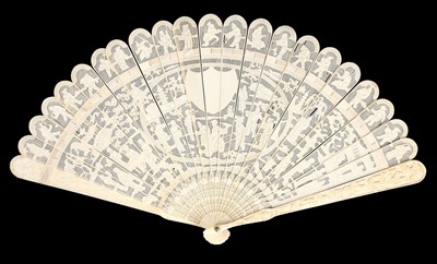 Lot 517 - A carved ivory brise fan, Chinese, circa...