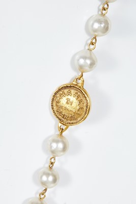 Lot 71 - A Chanel 'pearl' and coin sautoir, 1990s