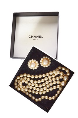 Lot 66 - A Chanel 'pearl' necklace and earrings set, 1980s