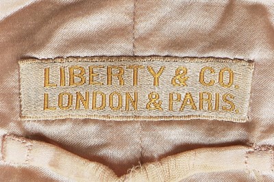 Lot 171 - A Liberty ivory satin kimono-style coat, circa...