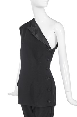 Lot 307 - A Jean Paul Gaultier asymmetric black gabardine suit, late 1980s-early 1990s