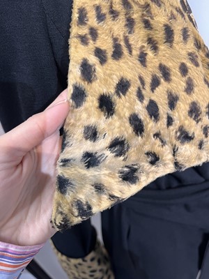 Lot 94 - A Biba black wool and faux cheetah 'dressing gown' jacket, circa 1973