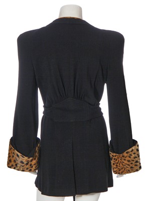 Lot 94 - A Biba black wool and faux cheetah 'dressing gown' jacket, circa 1973