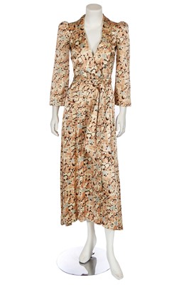 Lot 127 - A Biba floral printed satinised jersey coat dress, circa 1974