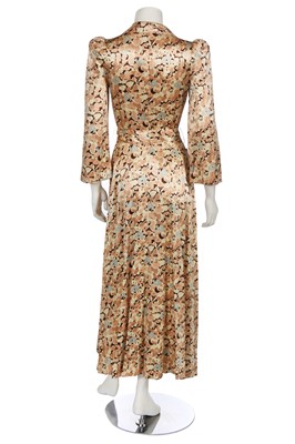 Lot 127 - A Biba floral printed satinised jersey coat dress, circa 1974