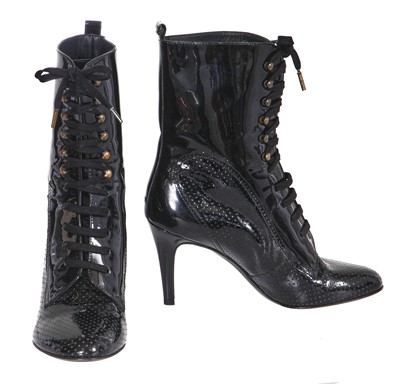 Lot 26 - A pair of Chanel black patent leather boots, 2010s