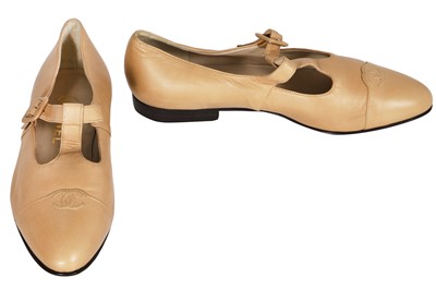 Lot 44 - A pair of Chanel tan leather T-bar Mary-Jane ballet flats, 2000s