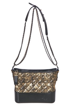 Lot 2 - A Chanel black and gold medium Gabrielle hobo bag, circa 2019