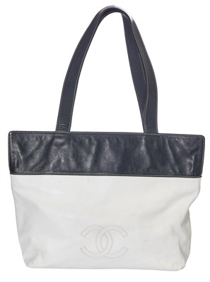 Lot 5 - A Chanel white and navy blue leather shopper tote, 1997-99