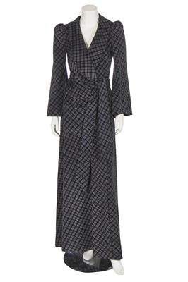 Lot 131 - A Biba black and grey checked polyester maxi coat, circa 1974