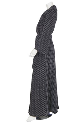 Lot 131 - A Biba black and grey checked polyester maxi coat, circa 1974