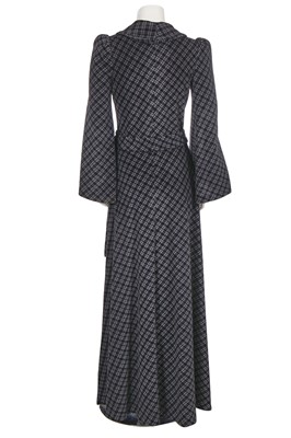 Lot 131 - A Biba black and grey checked polyester maxi coat, circa 1974