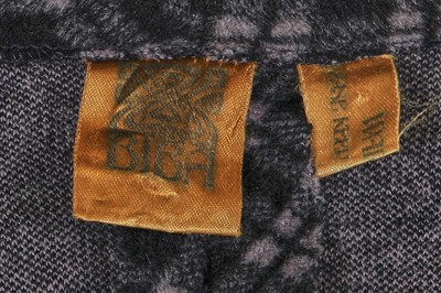 Lot 131 - A Biba black and grey checked polyester maxi coat, circa 1974