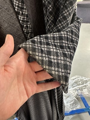 Lot 131 - A Biba black and grey checked polyester maxi coat, circa 1974