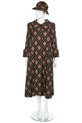 Lot 141 - A Biba black and brown checked viscose jersey swing coat and hat, circa 1974