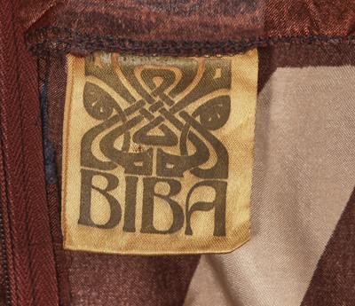 Lot 139 - A Biba printed satin cocktail dress, circa 1974