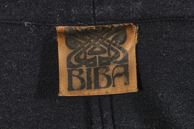 Lot 105 - A Biba black wool jersey suit, circa 1973