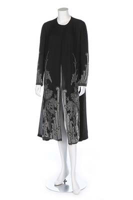 Lot 62 - A beaded chiffon evening coat, 1920s, with...