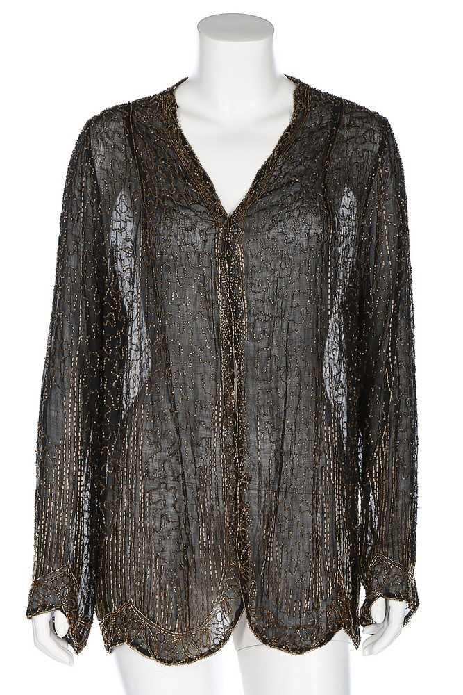 Lot 63 - A beaded jacket, 1920s, the black muslin...