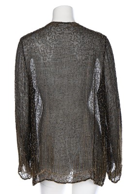 Lot 63 - A beaded jacket, 1920s, the black muslin...