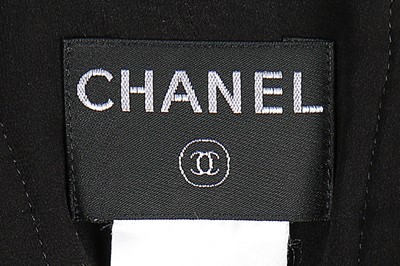 Lot 65 - A group of black Chanel separates, 2000s,...
