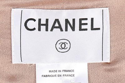 Lot 66 - A Chanel silk and wool suit, 2005, labelled,...