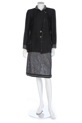 Lot 67 - A Chanel black wool and silver sequinned suit,...