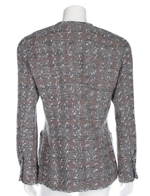 Lot 68 - A Chanel grey and silver tweed jacket, 1994,...