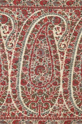 Lot 425 - A woven long shawl, probably Paisley,...