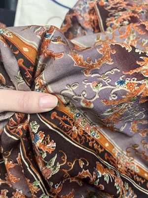 Lot 504 - A rare printed wool nursing day dress, circa 1845