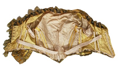 Lot 416 - An unusual yellow 'peacock' evening gown, circa 1875