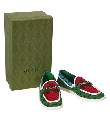 Lot 23 - A pair of Gucci men's multicolour monogrammed canvas moccasins, circa 2016