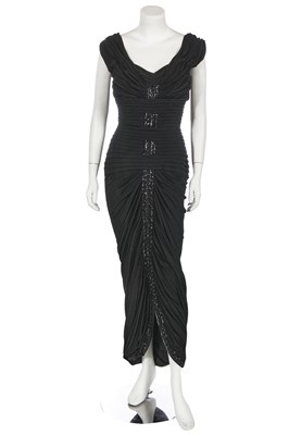 Lot 459 - A Norman Hartnell haute couture black jersey evening gown, 'Caesar's Wife' collection, Spring 1957