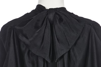 Lot 469 - A Callot Soeurs black satin-backed crepe evening coat, late 1920s