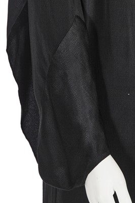Lot 469 - A Callot Soeurs black satin-backed crepe evening coat, late 1920s