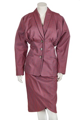 Lot 360 - A Bruce Oldfield purple and red skirt suit, similar to one worn by Princess Diana, 1985