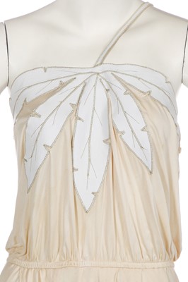 Lot 368 - A rare and early Gianni Versace cream jersey jumpsuit, 'Colonial Collection', Spring-Summer 1981