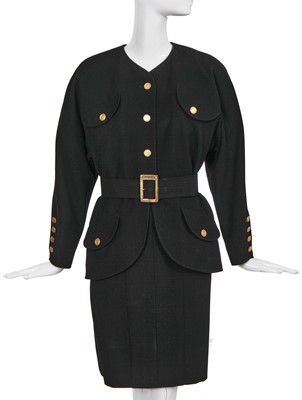 Lot 15 - A Chanel black wool suit, mid-1980s