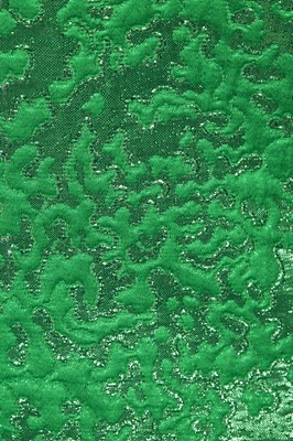 Lot 172 - An Yves Saint Laurent green matelassé suit, Spring-Summer 1990