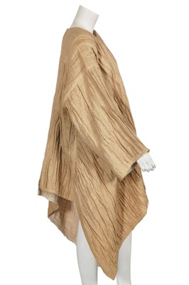 Lot 144 - An Issey Miyake crinkle textured tan linen coat, Autumn-Winter 1984-85