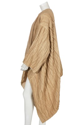 Lot 144 - An Issey Miyake crinkle textured tan linen coat, Autumn-Winter 1984-85